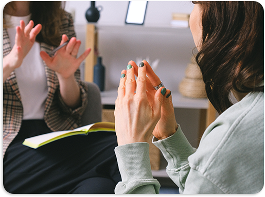 Women speaking to each other